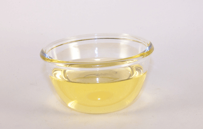 glass bowl with oil in it