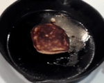 picture of my pancake cooking in a cast iron frying pan