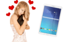 lady hugging her computer with a Samsung tablet pictured beside her, used as a header image