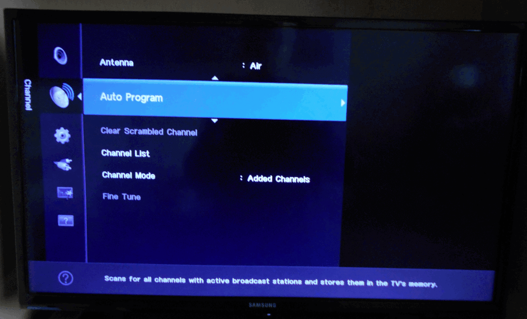 TV screen showing Auto Program selected